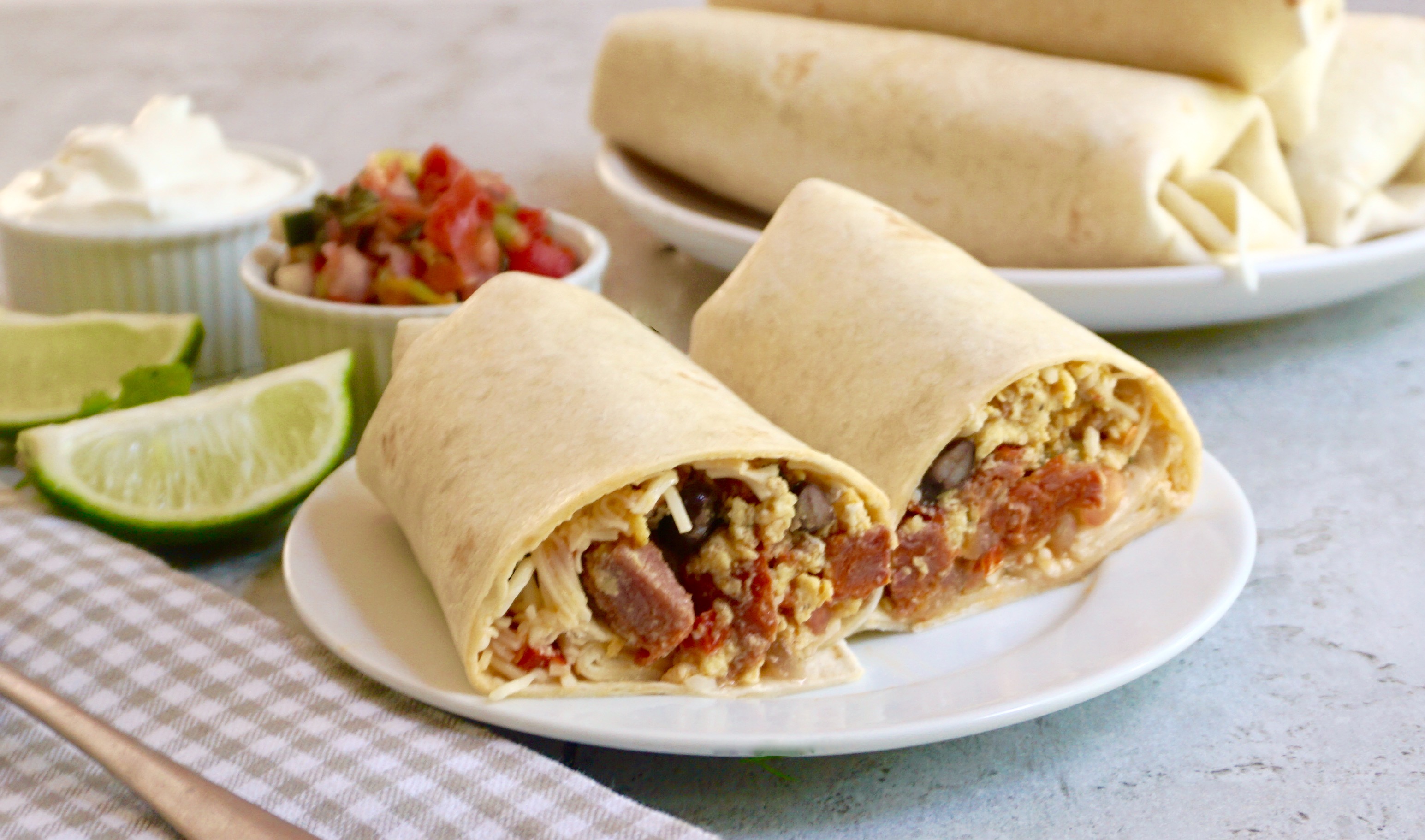 chorizo-breakfast-burrito-with-eggs-black-beans-salsa-and-cheese