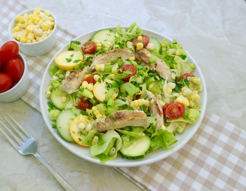 Farmers Market Salad is full of fresh ripe summer vegetables.