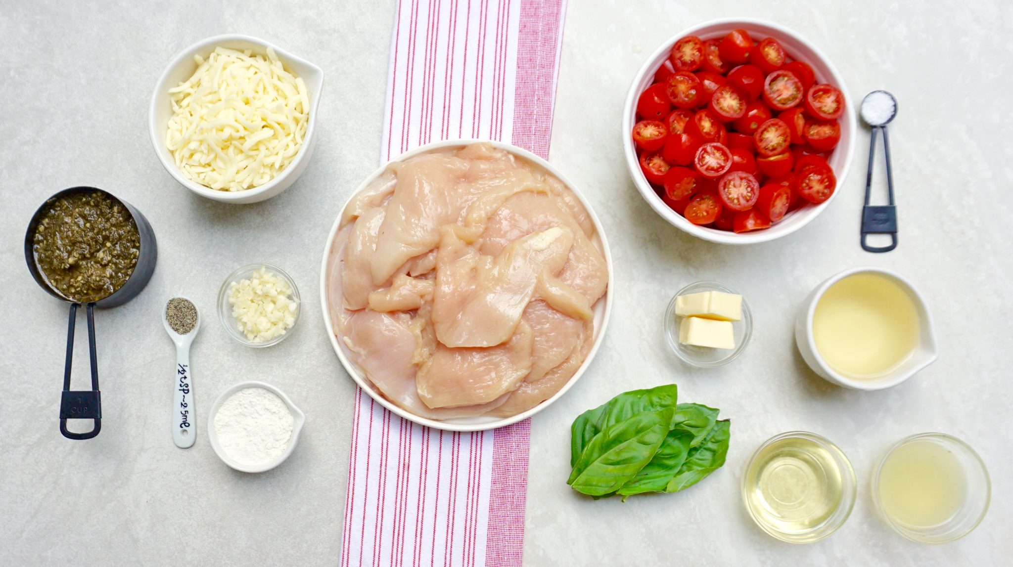 Margherita Chicken has a flavorful pesto and tomato topping