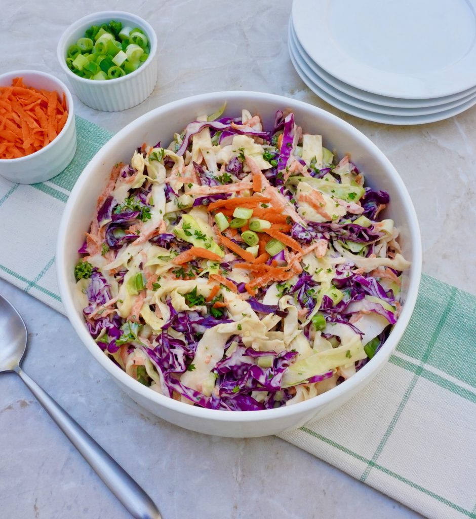 Tri Color Cole Slaw is a creamy vegetable side salad.