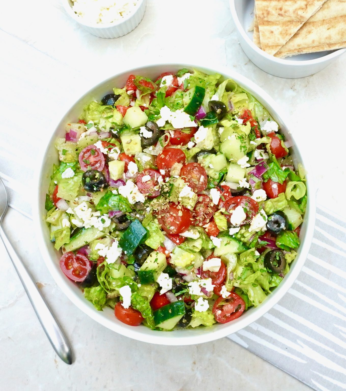 Chopped Greek Salad is a flavorful vegetarian side dish.