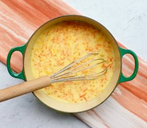 Orange filling ingredients in saucepan